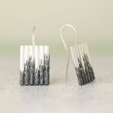 Flux undulating earrings by Rebecca Burt