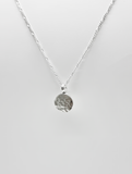 Hammered blobby pendant by Rebecca Oldfield
