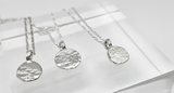 Hammered blobby pendant by Rebecca Oldfield