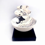 3 rocking bowls on plinth by Kim Colebrook
