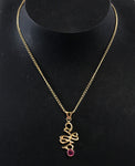 Celtic Influence gold & ruby necklace by Selwyn Gale