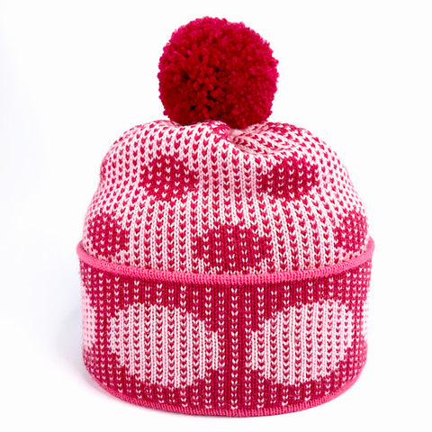 Spotted two-way hat in pink with red pom pom by Alison Taylor