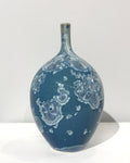 Crystaline bottle form in teal by Simon Rich