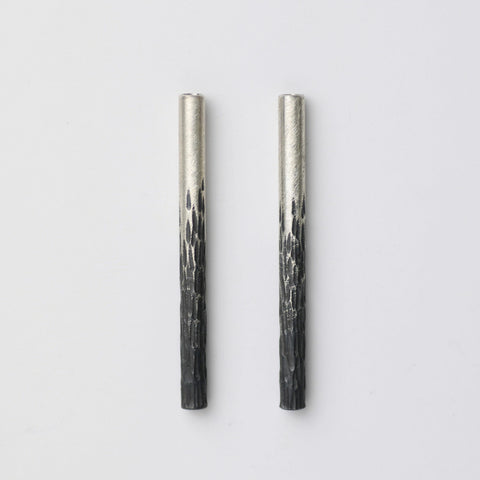 Flux gradient earrings in oxidised silver by Rebecca Burt