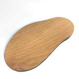Kidney shaped oak board by Howard Lewis