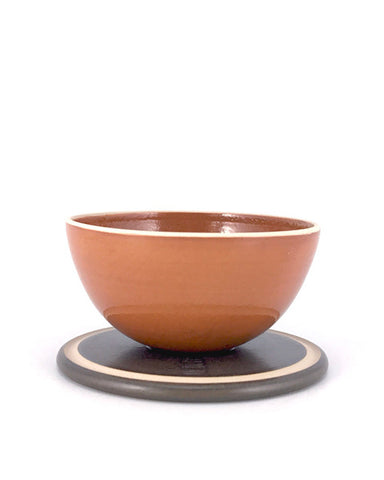 Tea bowl & saucer in rust by Ian Rylatt