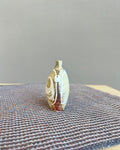 Stoneware Penarlâg slip ratting pebble bottle by Kirsti Hannah Brown