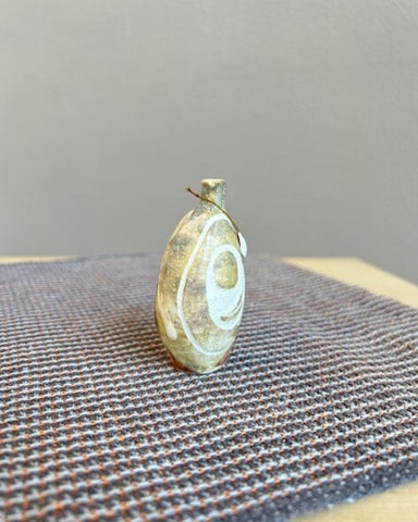 Stoneware Penarlâg slip ratting pebble bottle by Kirsti Hannah Brown
