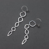 Neptunea earrings 5's by Karen Williams