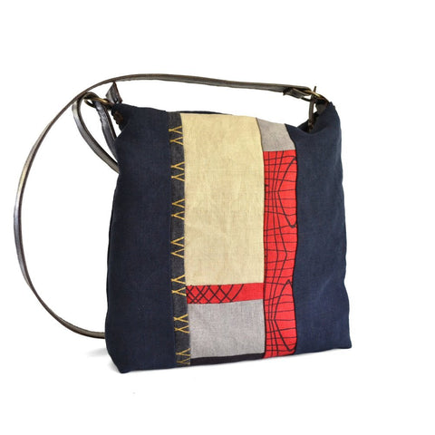 Large red 'no waste' bag by Lynda Shell