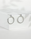 Sterling Silver Drop Circle Earrings by Rebecca Oldfield