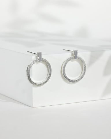 Sterling Silver Drop Circle Earrings by Rebecca Oldfield