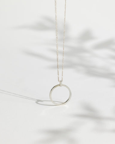 Circle Sparkle Necklace by Rebecca Oldfield