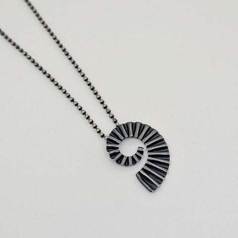 Maxi dark ammonite pendant by Suzie Horan