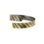 Oxidised silver ripple cuff with gold waves by Sandra Elizabeth