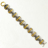 Wave bracelet oxidised with gold waves by Sandra Elizabeth