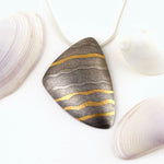 Oxidised silver shell form pendant by Sandra Elizabeth