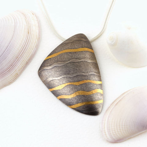 Oxidised silver shell form pendant by Sandra Elizabeth