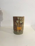 Silver birch bark pot with twined poppies by Jane Bevan