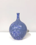Small crystaline bottle form in mid blue by Simon Rich