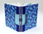 Book with Buttonhole Binding by/gan Carole King