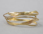 'Amrwd' Wrapped Bangle in Brass by Ann Catrin Evans