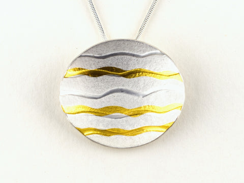 Silver wave pendant with gold waves by Sandra Elizabeth