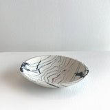 Wide rocking bowl by Kim Colebrook