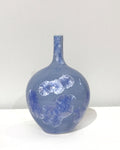 Small crystaline bottle form in mid blue by Simon Rich