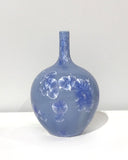 Small crystaline bottle form in mid blue by Simon Rich