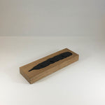 Hand Carved Feather in Slate with Oak Base by Meic Watts