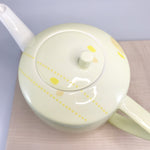 Yellow Teapot by Lowri Davies