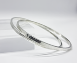 Hammered SIlver bangle by Rebecca Oldfield